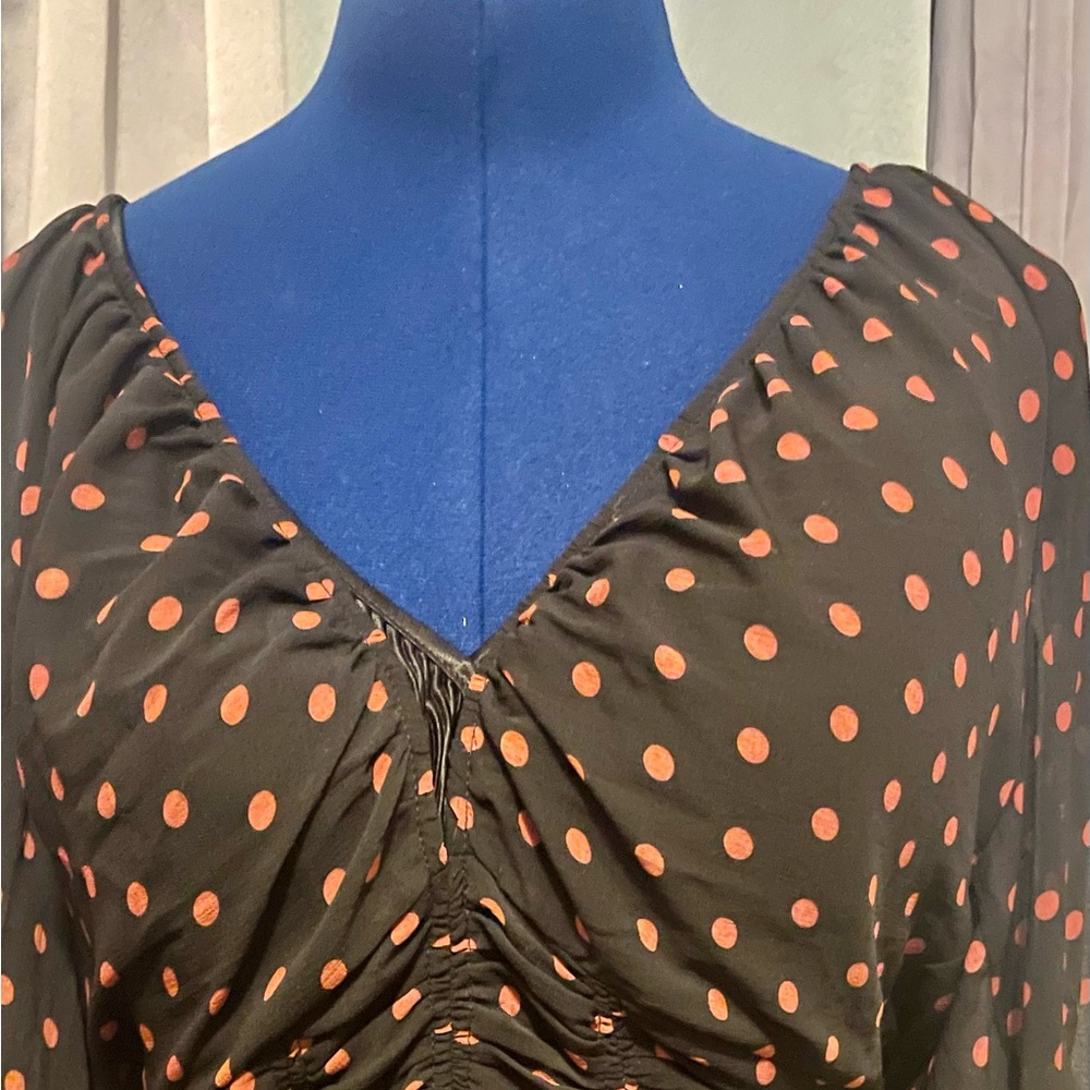 Cute Beyound the radar blouse. Almost see through.